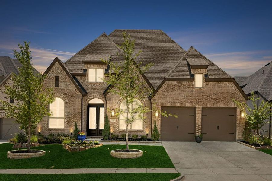 Front exterior of a new home in Sandbrock Ranch, Aubrey, TX, highlighting curb appeal (Image 2).