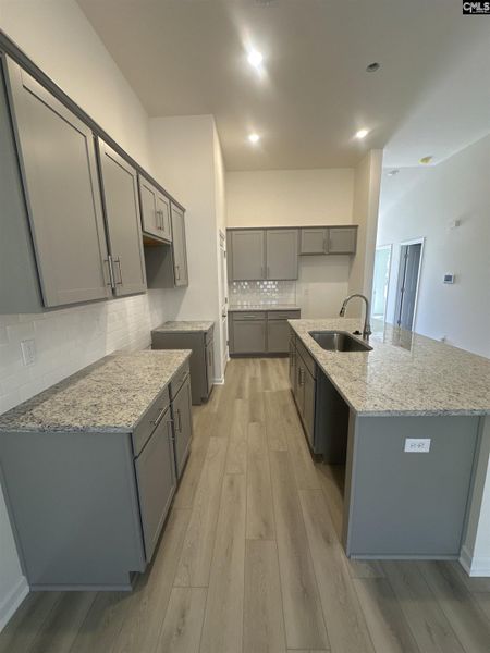 Furnished interior view inside a new home in Piney Woods Bluff, Columbia (Image 6). Furnished interior view inside a new home in Piney Woods Bluff, Columbia (Image 6).