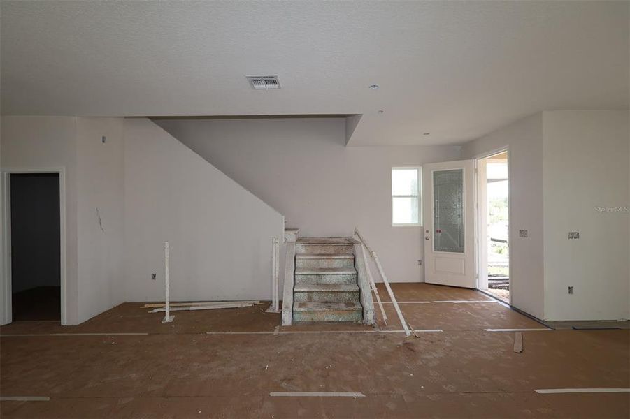 In-progress construction of a new home in Center Lake on the Park, St. Cloud, FL (Image 12).