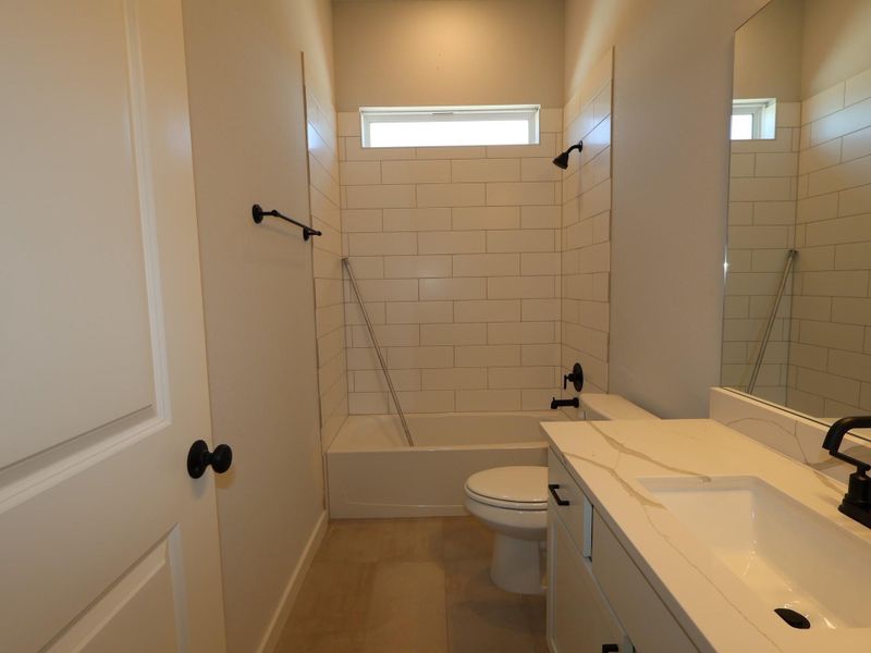 Furnished interior view inside a new home in Heritage, Dripping Springs (Image 9).