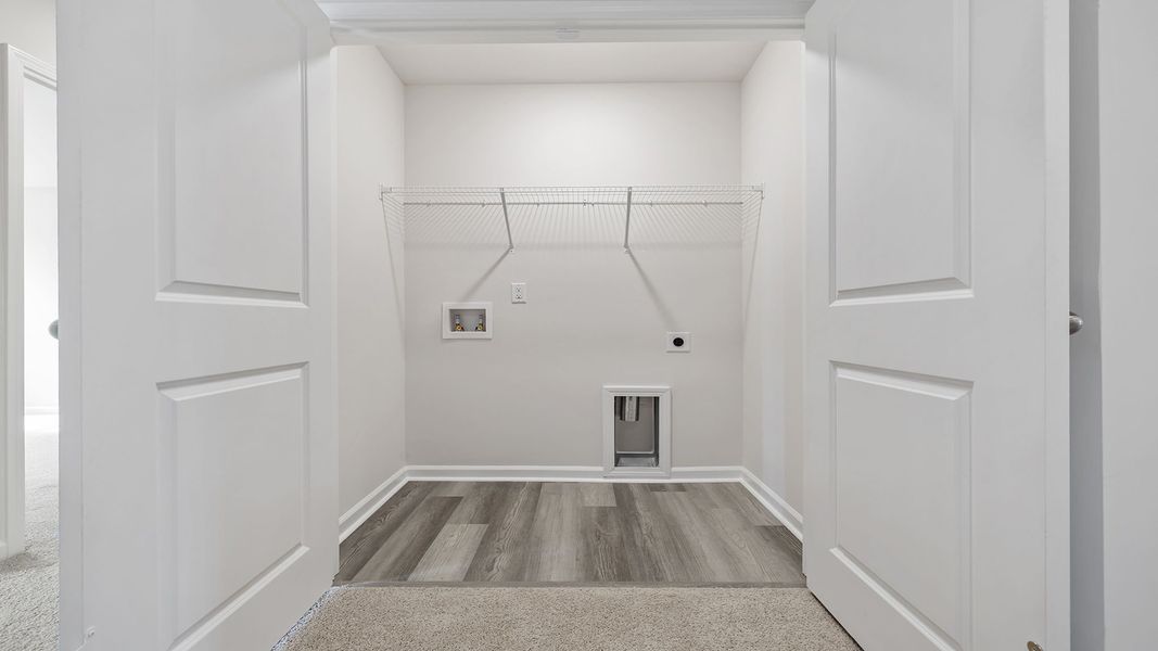 Spacious, unfurnished interior of a new home in Tanglewood Townes, Greenville (Image 27).