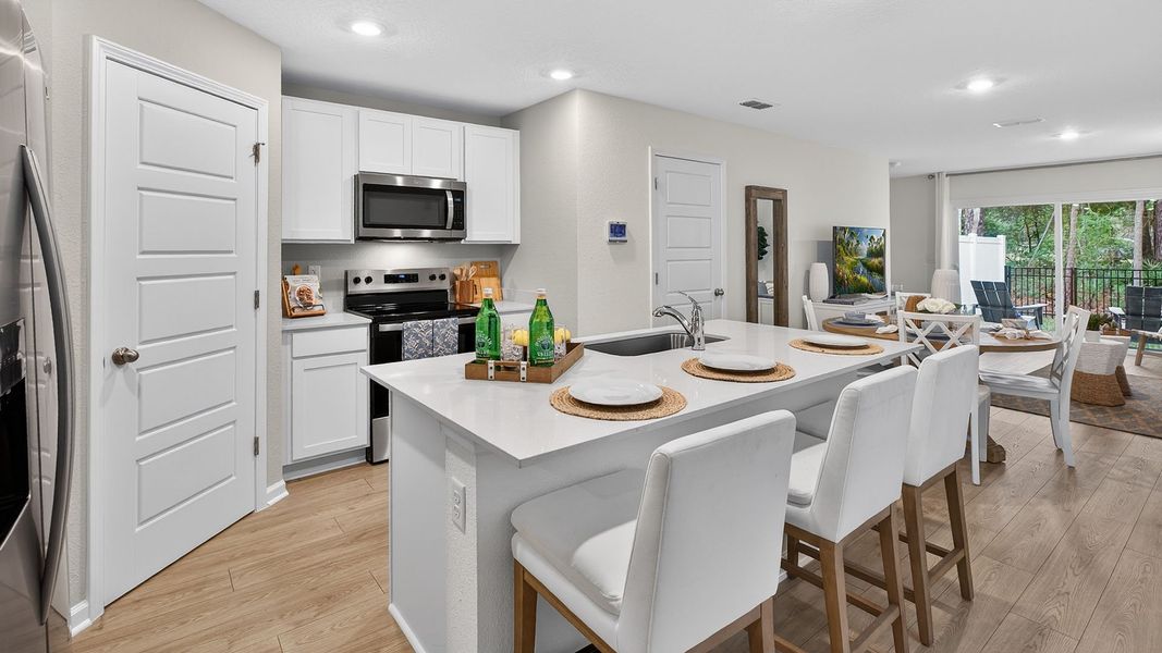 Representative furnished interior of a home built from the Plan by D.R. Horton in Irongate Villas, Jacksonville (Image 5).