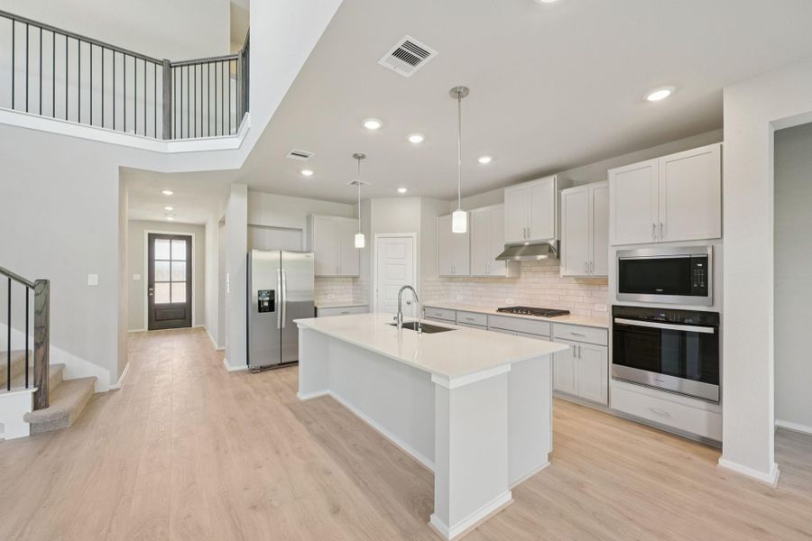 Furnished interior view inside a new home in Riviera Pines - Classic Series, Huffman (Image 12).