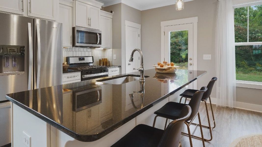 Furnished interior view inside a new home in Sidney Creek Townhomes, Zebulon (Image 10).