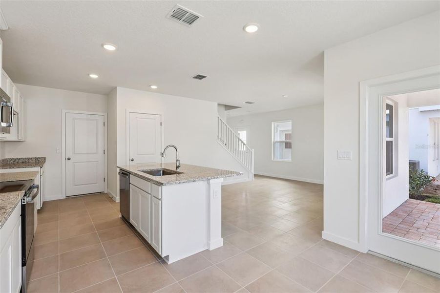 Furnished interior view inside a new home in Cyrene at Harmony, St. Cloud (Image 10).
