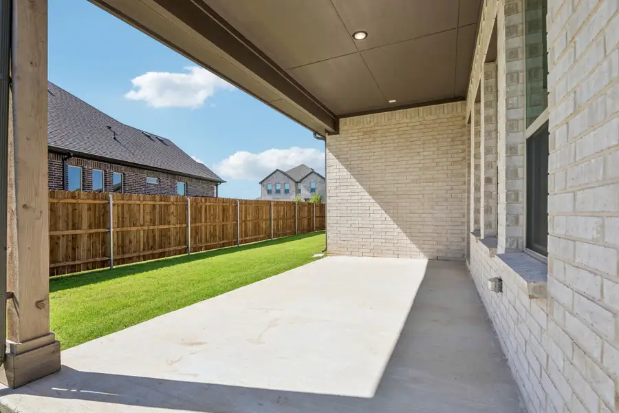 Exterior details and patio area of a home in Sheppard's Place, Waxahachie (Image 3).