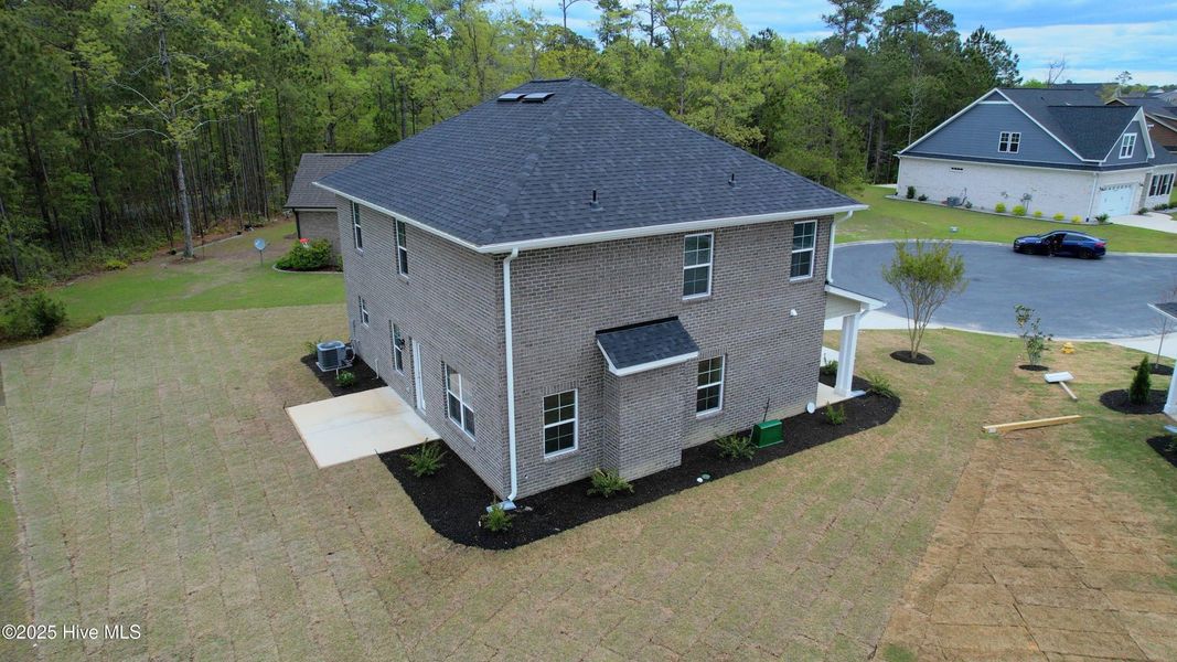 Front exterior of a new home in Palmetto Creek, Bolivia, NC, highlighting curb appeal (Image 2).