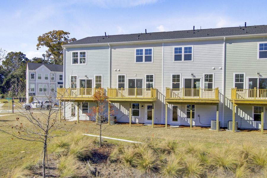 Exterior details and patio area of a home in , Johns Island (Image 21).