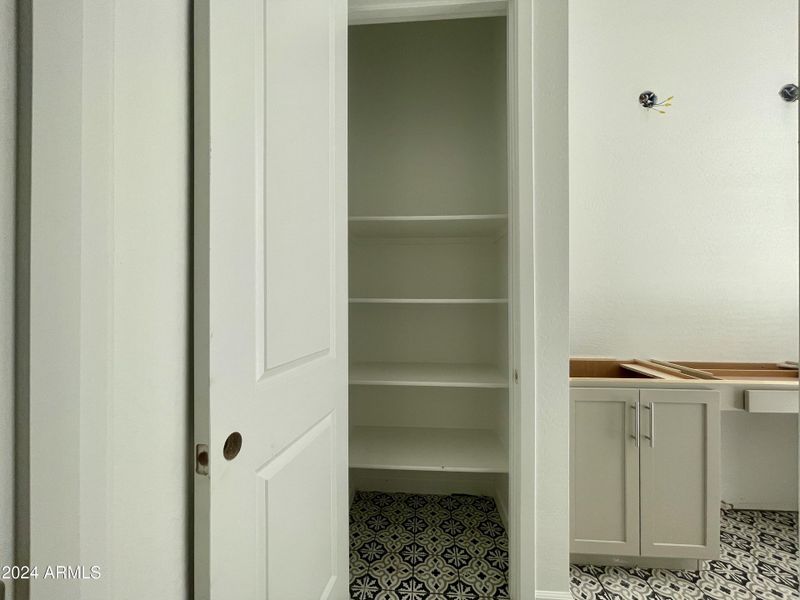 012 Linen closet primary bathroom