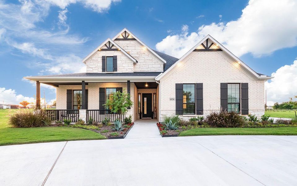 Front exterior of a new home in Marvida, Cypress, TX, highlighting curb appeal (Image 22).