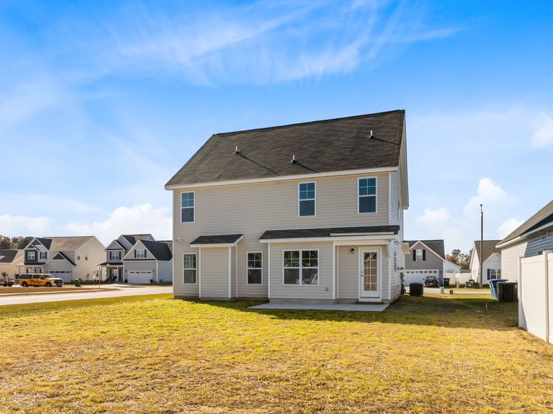Exterior details and patio area of a home in Arbor Hills South, Greenville (Image 22).