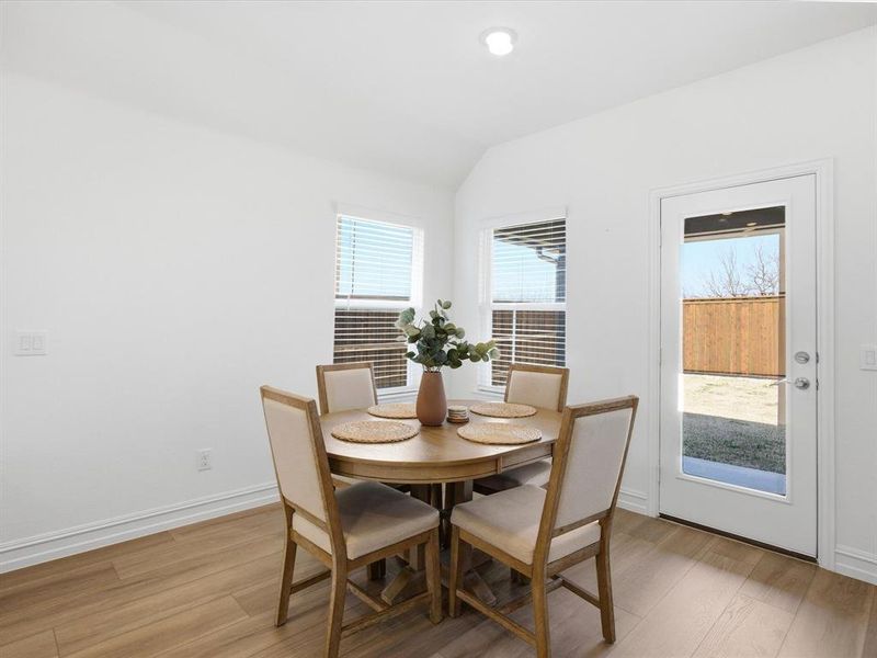 Breakfast room view of single story three bedroom home with an office and a formal dining room