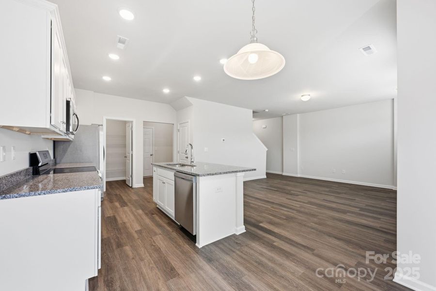 Furnished interior view inside a new home in , Statesville (Image 8).