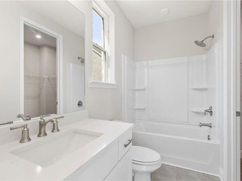 Furnished interior view inside a new home in Melody Lakeside Estates, Buford (Image 12).