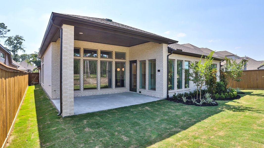 Exterior details and patio area of a home in The Highlands, Porter (Image 2).