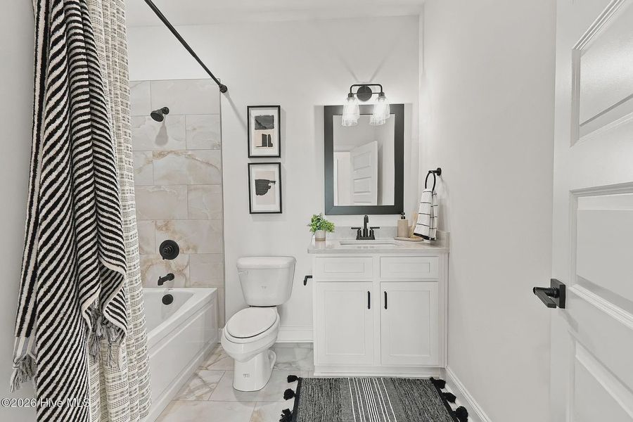 Furnished interior view inside a new home in Dixon Grove, Grimesland (Image 17).