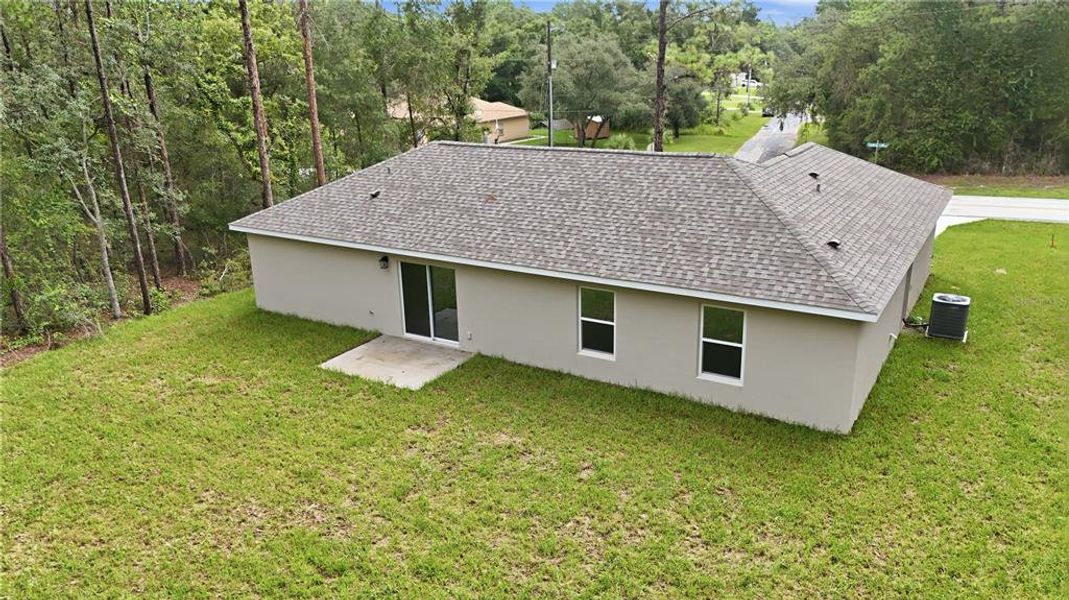 Exterior details and patio area of a home in , Citrus Springs (Image 3).