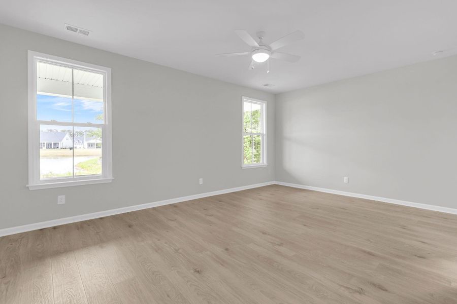 Spacious, unfurnished interior of a new home in Tidewater at Lakes of Cane Bay, Summerville (Image 35). Spacious, unfurnished interior of a new home in Tidewater at Lakes of Cane Bay, Summerville (Image 35).