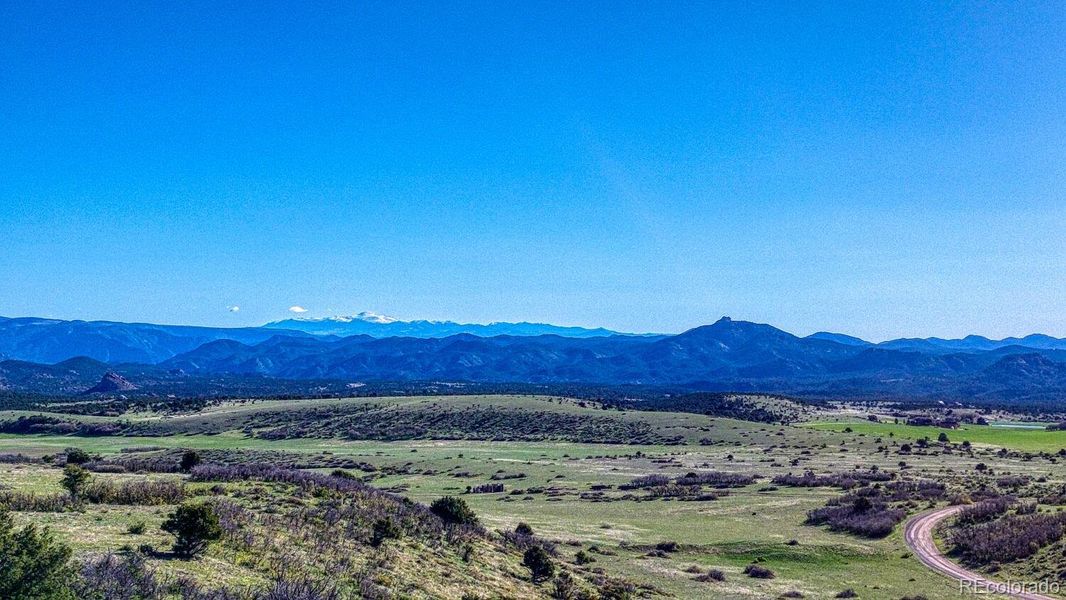 Pikes Peak rising in the distance to the east. Pikes Peak rising in the distance to the east.