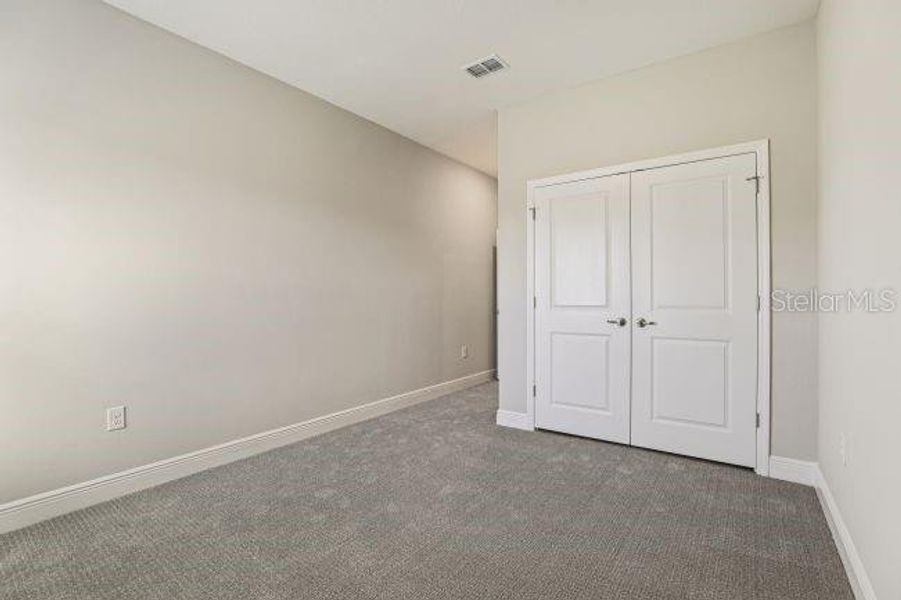 Spacious, unfurnished interior of a new home in Bella Estates, Plant City (Image 22).