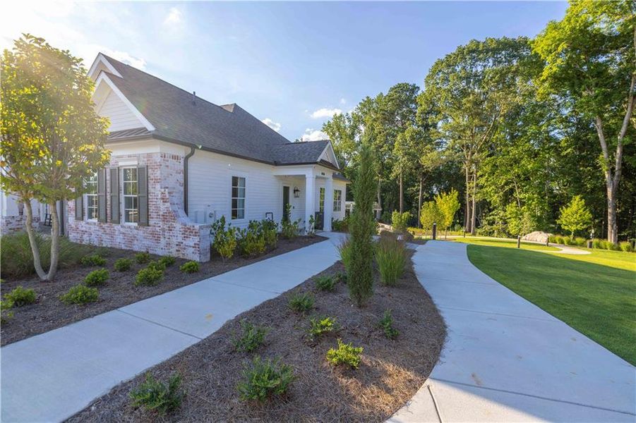 Front exterior of a new home in , Peachtree Corners, GA, highlighting curb appeal (Image 22).