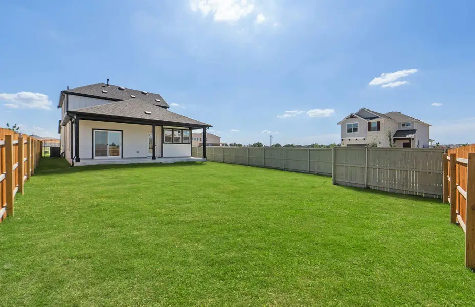 Exterior details and patio area of a home in Santa Rita Ranch, Liberty Hill (Image 22).