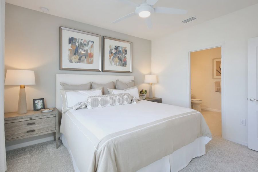 Representative furnished interior of a home built from the Morgan by Neal Communities in SkySail, Naples (Image 12).
