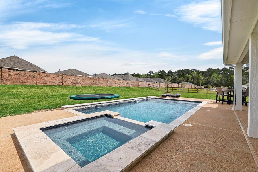 Modern sport-style pool and spa, very low-maintenance and perfect for those Texas summers!