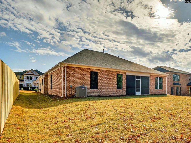 Exterior details and patio area of a home in Collins Cove, Chapin (Image 25).