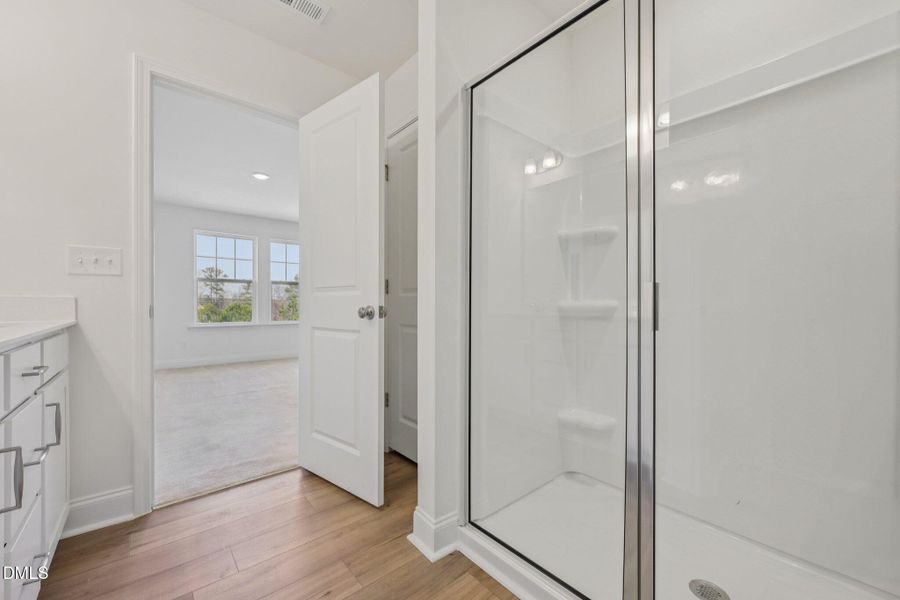 Primary Bath with private linen closet Primary Bath with private linen closet