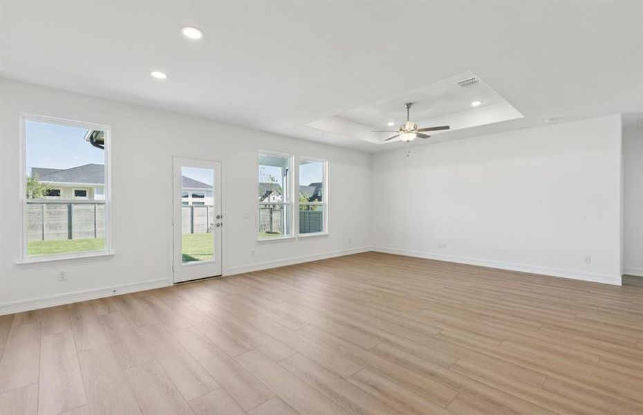 Expansive gathering room bathed in natural sunlight