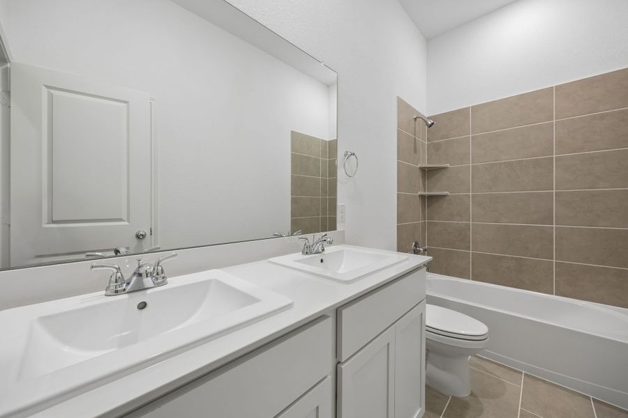 Furnished interior view inside a new home in Riviera Pines, Huffman (Image 16).