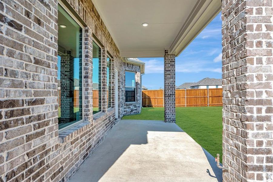 Exterior details and patio area of a home in Lilyana, Celina (Image 24).