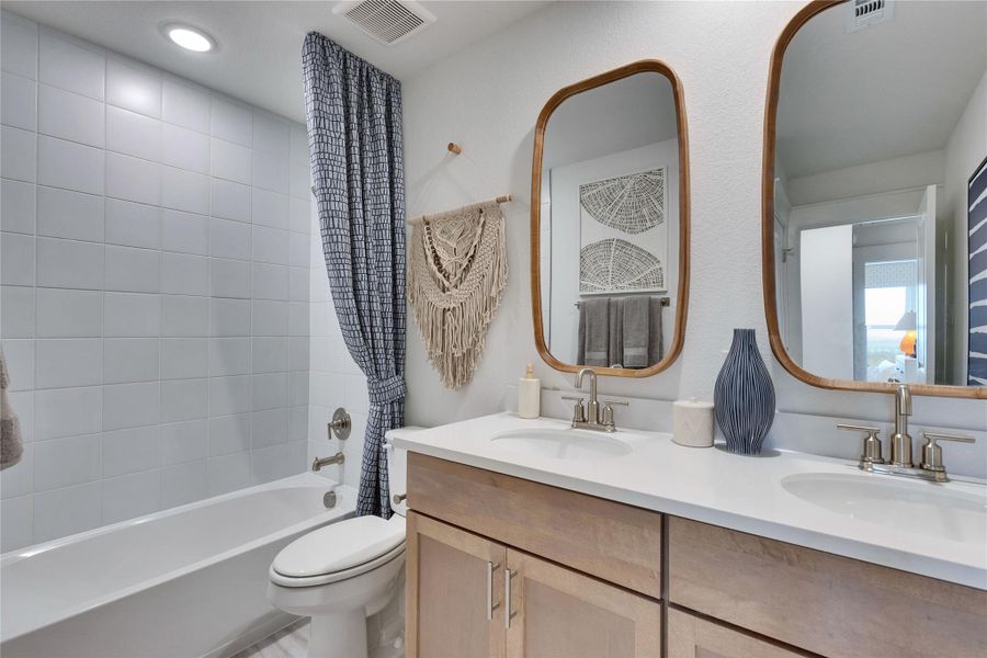 Furnished interior view inside a new home in Whisper South, San Marcos (Image 29).