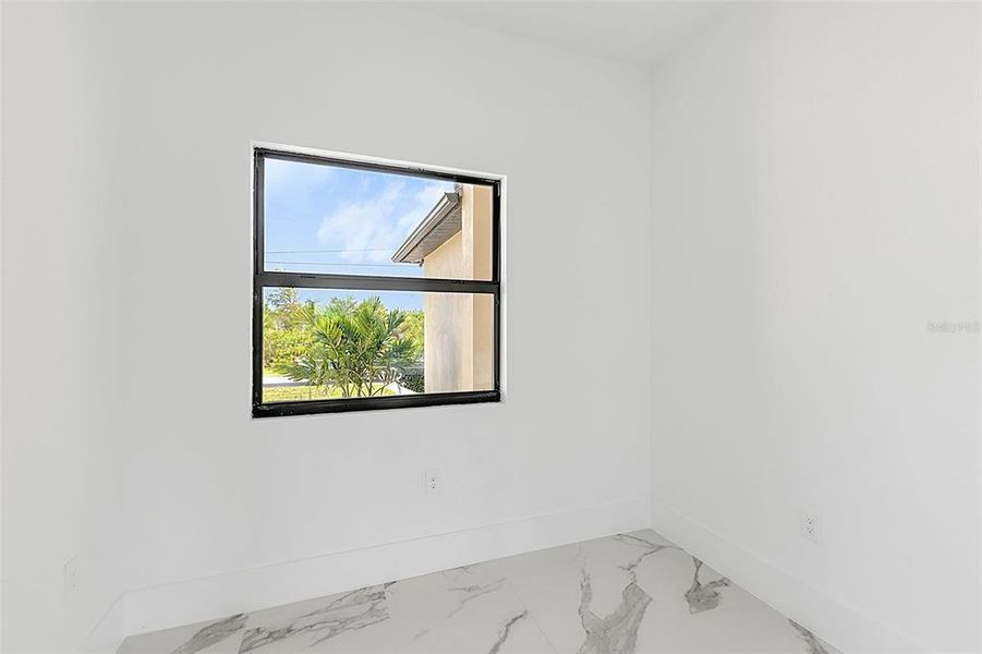 Spacious, unfurnished interior of a new home in , Port Charlotte (Image 24).