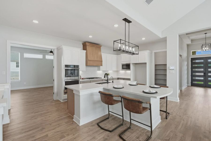 Representative furnished interior of a home built from the Gregory by Chesmar Homes in Potranco Oaks 100's, Castroville (Image 5).