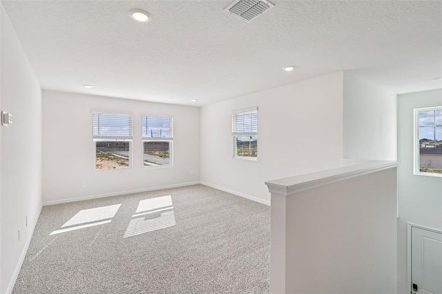 Spacious, unfurnished interior of a new home in Crosswinds - Signature Series, Haines City (Image 22).