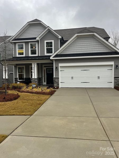 Front exterior of a new home in Grier Meadows, Charlotte, NC, highlighting curb appeal (Image 19).