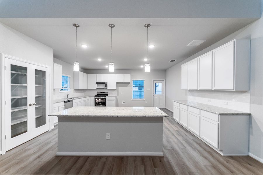 Furnished interior view inside a new home in Hennersby Hollow, San Antonio (Image 3).