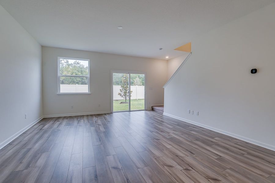 Spacious, unfurnished interior of a new home in Orchard Park Townhomes, St. Augustine (Image 6).