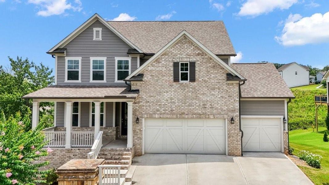 Front exterior of a new home in , Cartersville, GA, highlighting curb appeal (Image 1). Front exterior of a new home in , Cartersville, GA, highlighting curb appeal (Image 1).