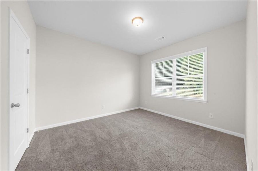 Spacious, unfurnished interior of a new home in River Rock, Ball Ground (Image 22).