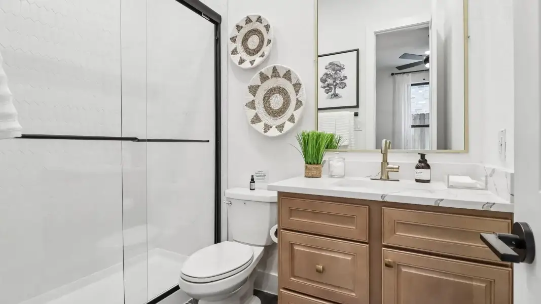 Representative furnished interior of a home built from the Lauren by Chesmar Homes in Audubon, Magnolia (Image 25).