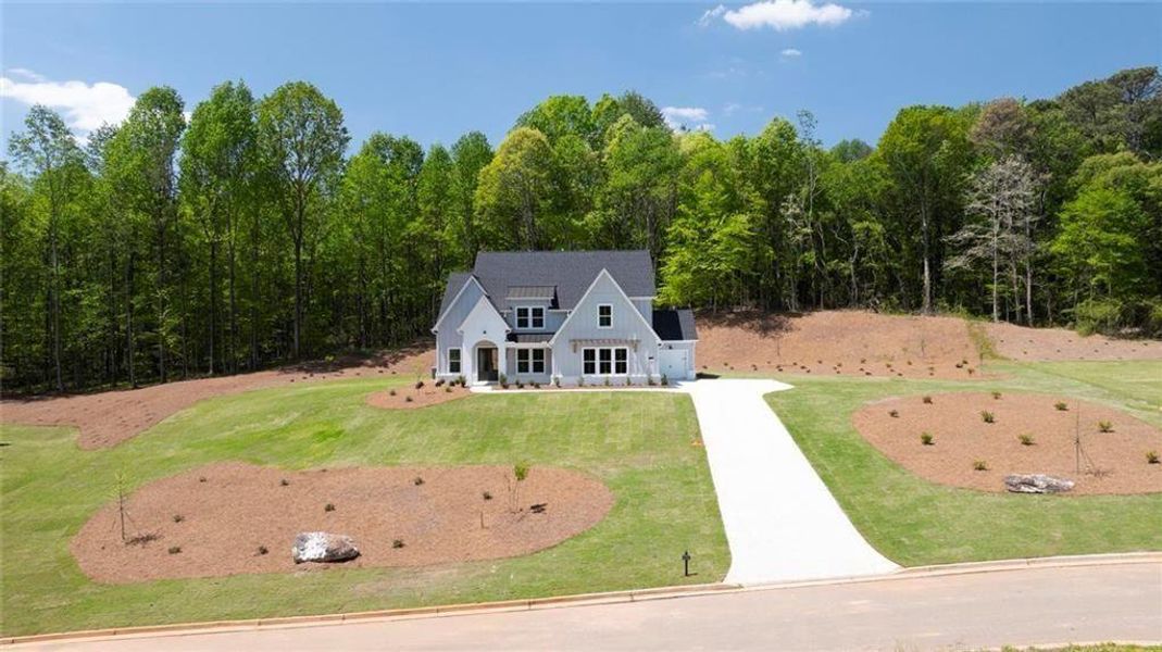 Front exterior of a new home in , Gainesville, GA, highlighting curb appeal (Image 26).