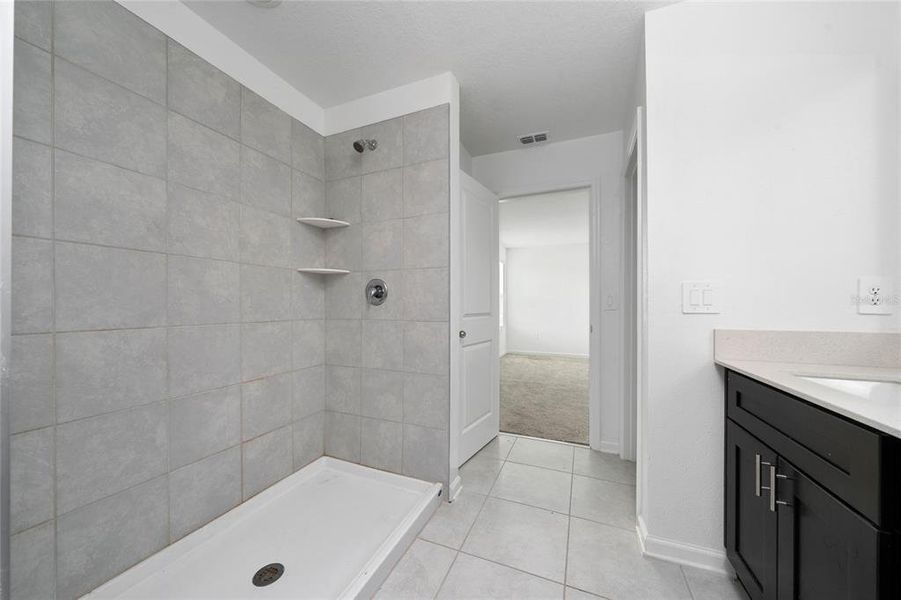 Furnished interior view inside a new home in Ranches at Lake Mcleod: Legacy Collection, Eagle Lake (Image 6).