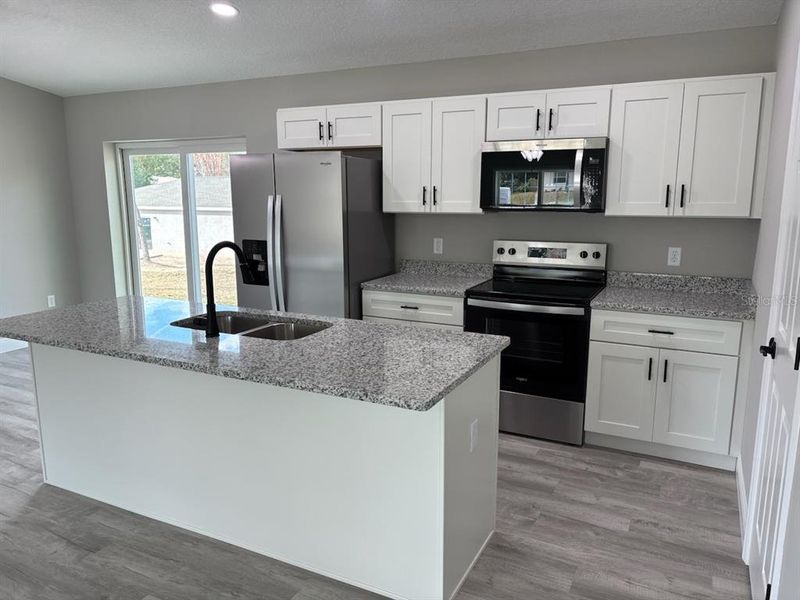 Furnished interior view inside a new home in , Citrus Springs (Image 5).