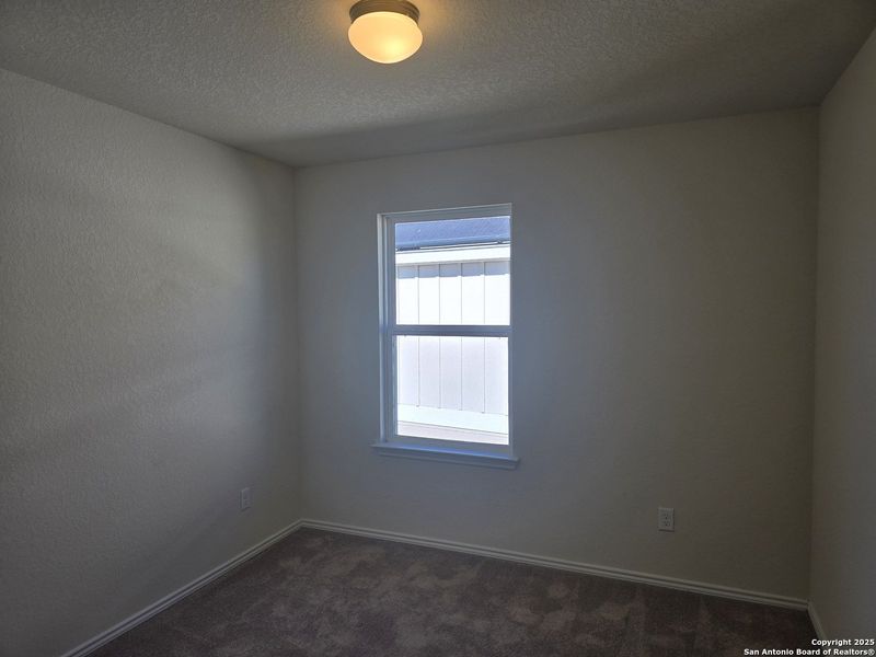Spacious, unfurnished interior of a new home in Davis Ranch, San Antonio (Image 10).