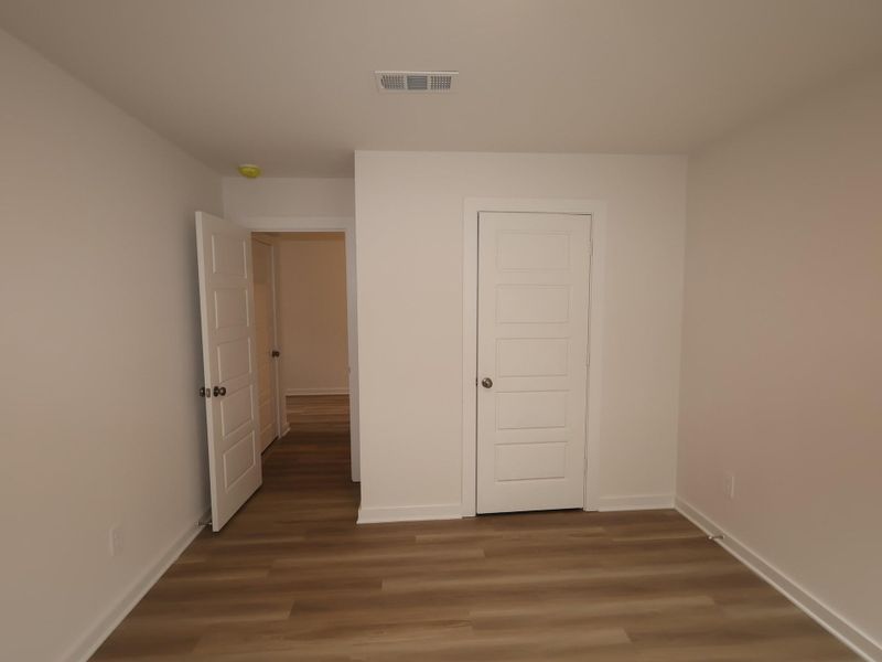 Spacious, unfurnished interior of a new home in Pinewood at Grand Texas, New Caney (Image 16).