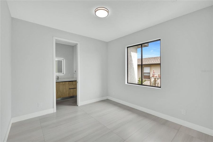 Spacious, unfurnished interior of a new home in , Port Charlotte (Image 20).