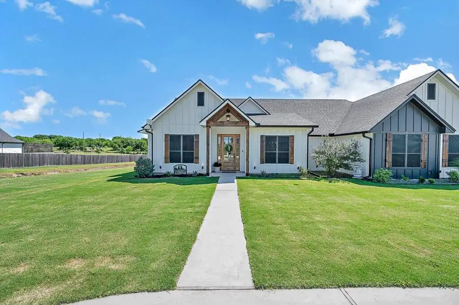Front exterior of a new home in , Lorena, TX, highlighting curb appeal (Image 23).